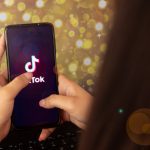woman-interacted-with-cell-phone-opening-tiktok